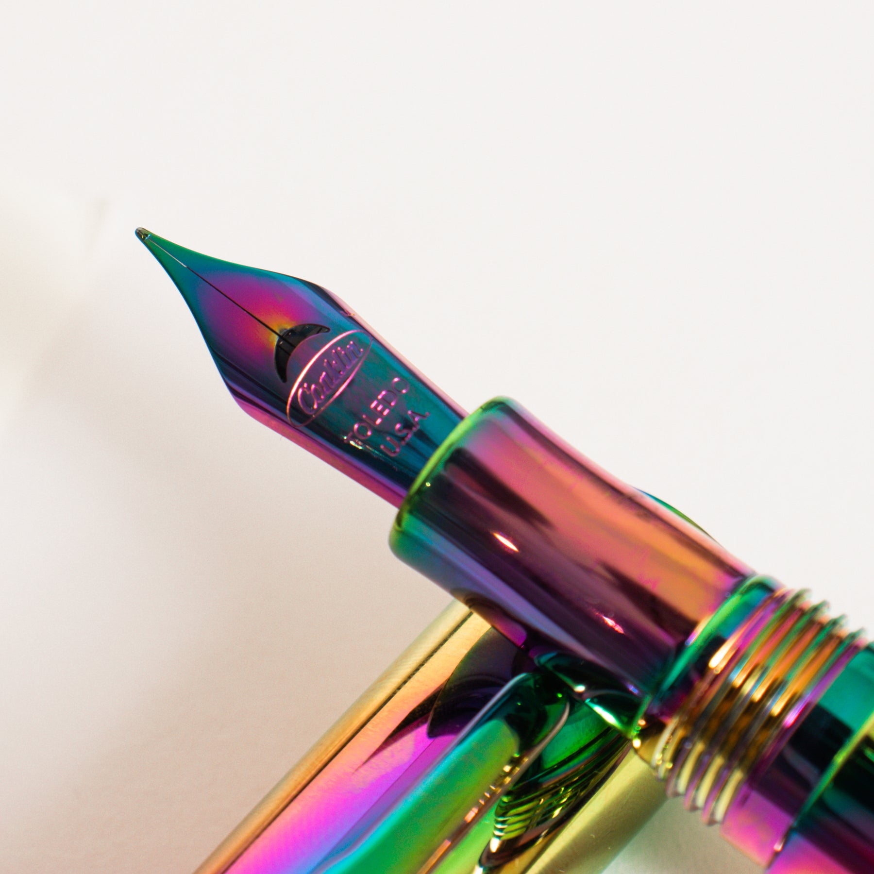 https://www.truphaeinc.com/cdn/shop/products/Conklin-All-American-Rainbow-Fountain-Pen-Stainless-Steel-Nib-Detail_1800x1800.jpg?v=1644517858