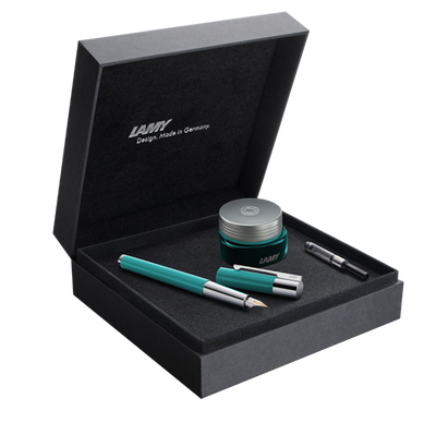 The LAMY Scala Majestic Jade fountain pen displayed in a collector's box, nestled in a bed of plush velvet. The box is adorned with subtle embossing, hinting at the exclusivity of this limited-edition writing instrument.