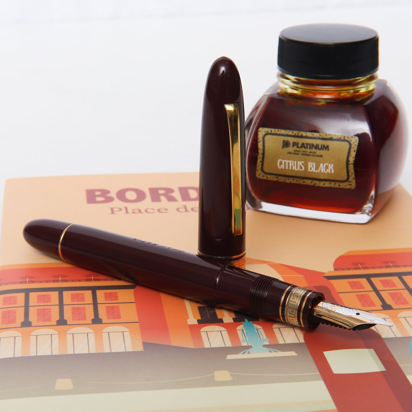 Omas 557S Burgundy & Gold Fountain Pen - Preowned Uncapped
