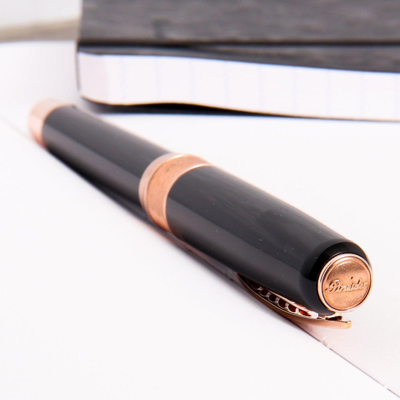 Pineider La Grande Bellezza Rocco Black with Rose Gold Trim Rollerball Pen Cap Top