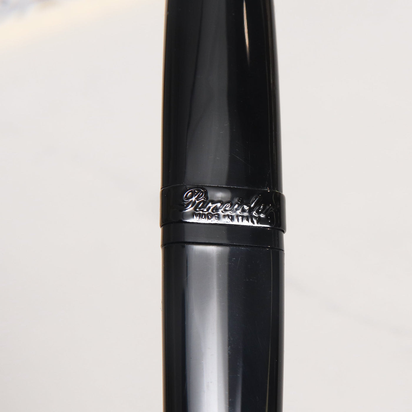 Pineider Modern Times All Black Rollerball Pen Logo