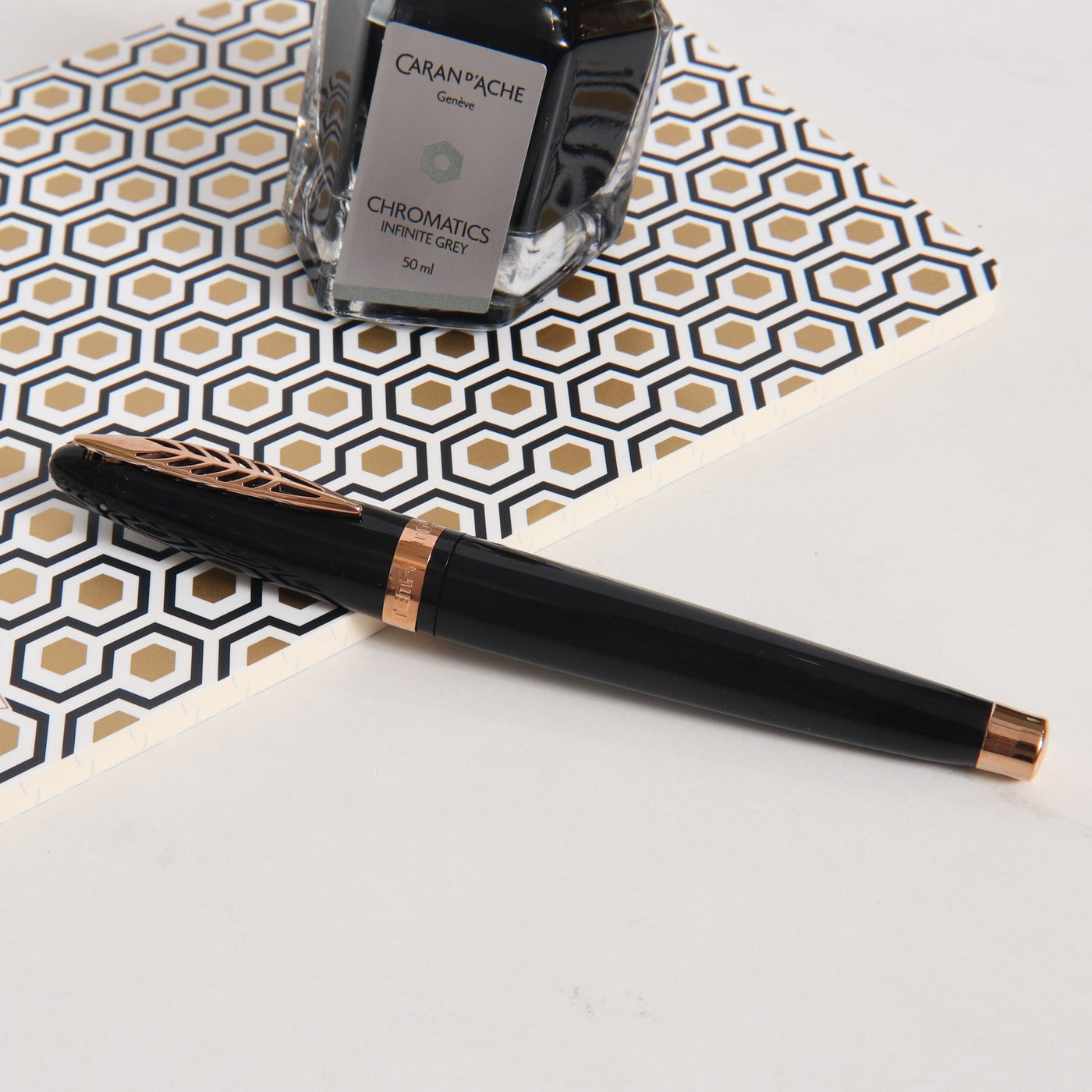 Pineider Modern Times Black & Rose Gold Rollerball Pen Capped