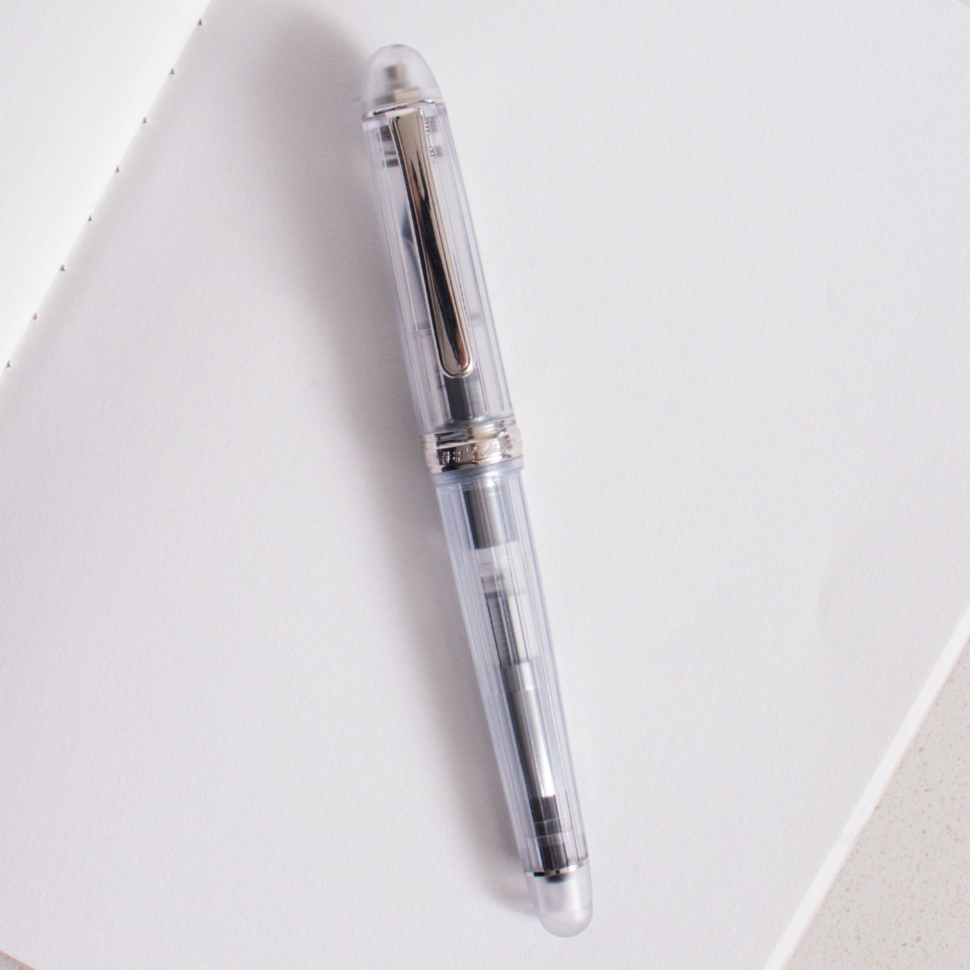 https://www.truphaeinc.com/cdn/shop/products/Platinum-3776-Nice-Rhodium-Fountain-Pen-Clear-Demonstrator_1400x.jpg?v=1638916076