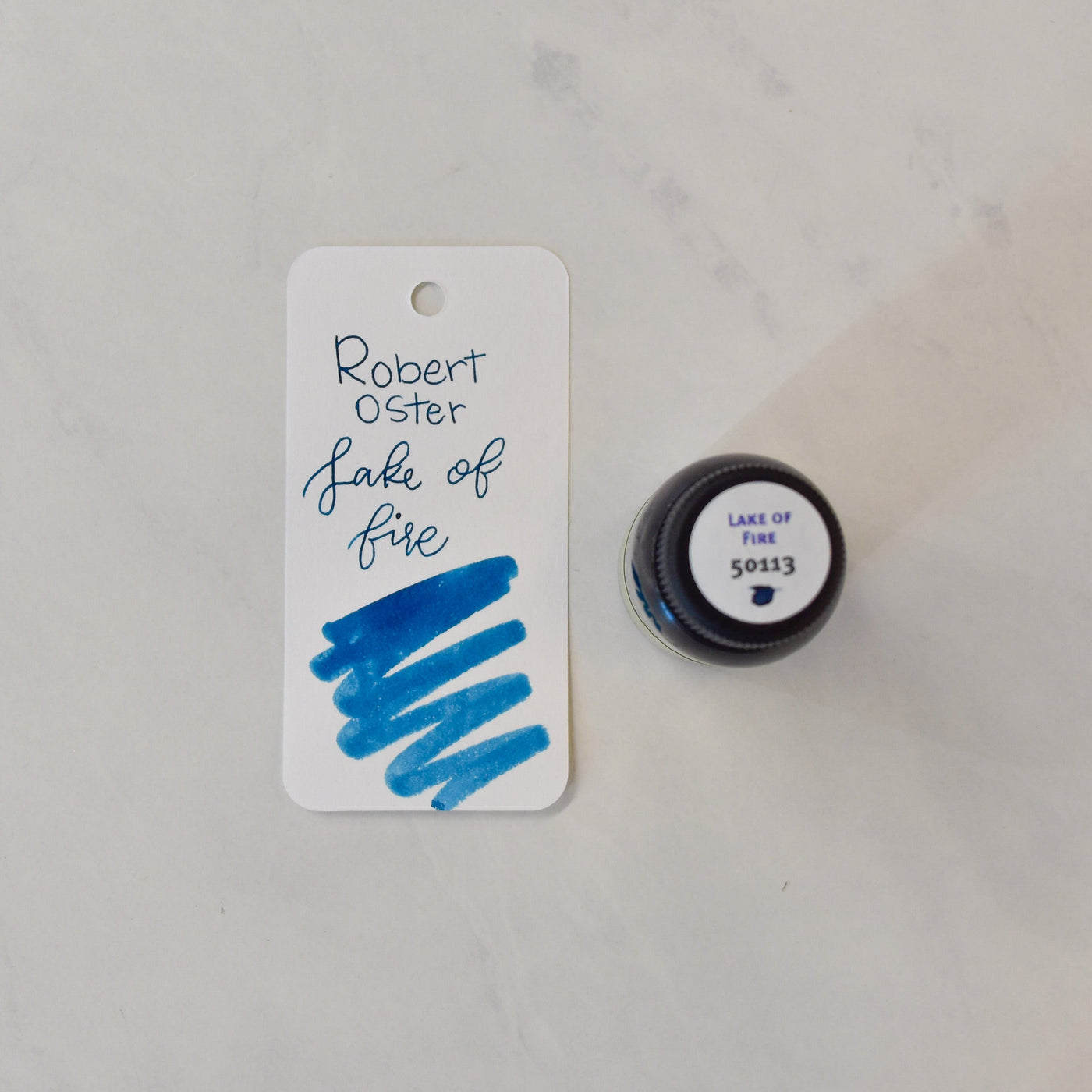 Robert Oster Lake of Fire Ink blue glass bottle