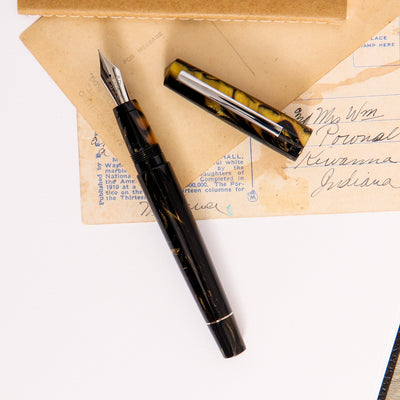Tibaldi-Infrangible-Black-Gold-Fountain-Pen-With-Silver-Trim